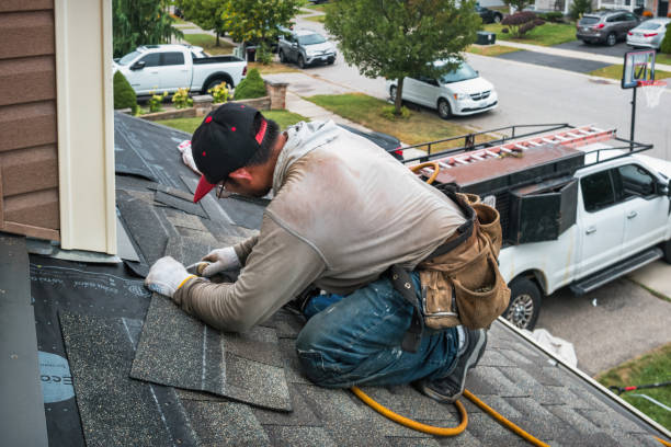 Professional Roofing technician working in Chester, MA